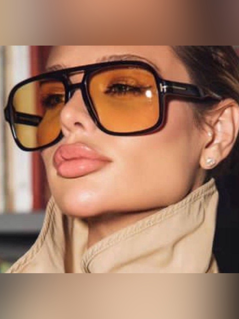 A Classy Chic Boutique Black Frame Sunglasses with Amber Lenses